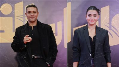 بالصور .. آسر ياسين وأسماء جلال يحتفلان بالعرض الخاص لفيلم إن غاب القط