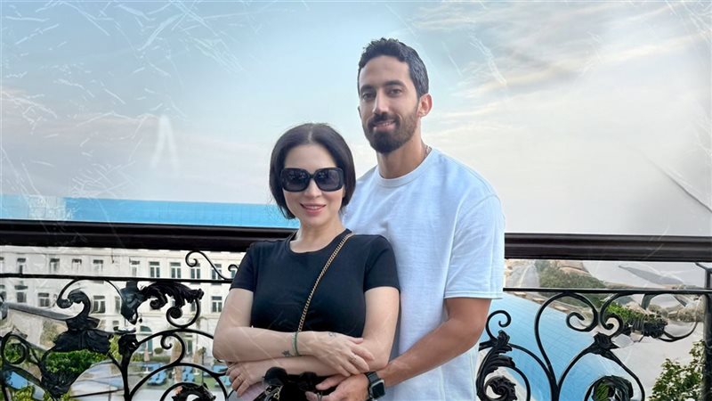 مي عز الدين وزوجها